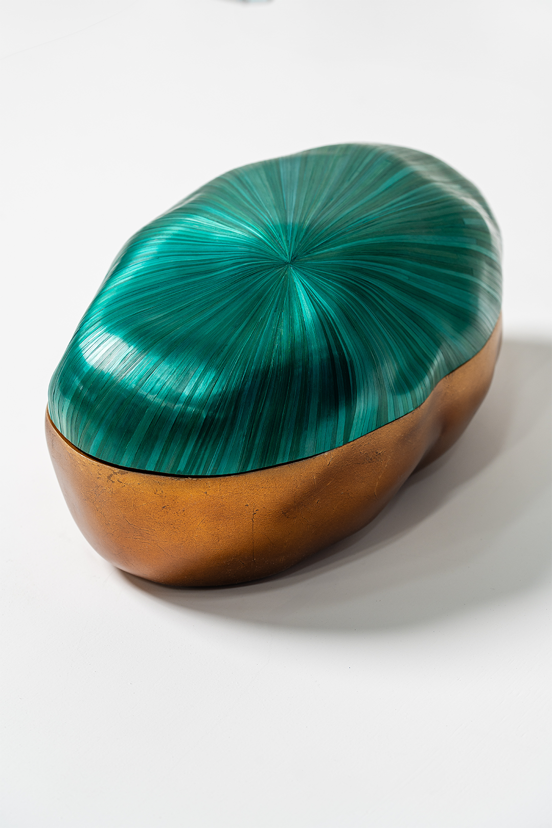 sculptural box with a radiant green straw marquetry lid